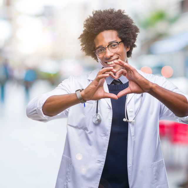 Doctor holding hands in the shape of a heart