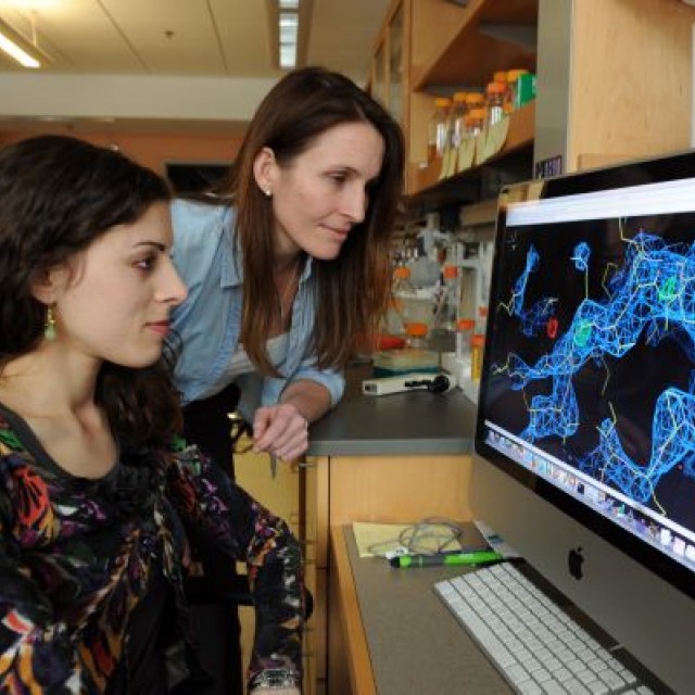 Faculty member Erin Adams with former student Louise Scharf