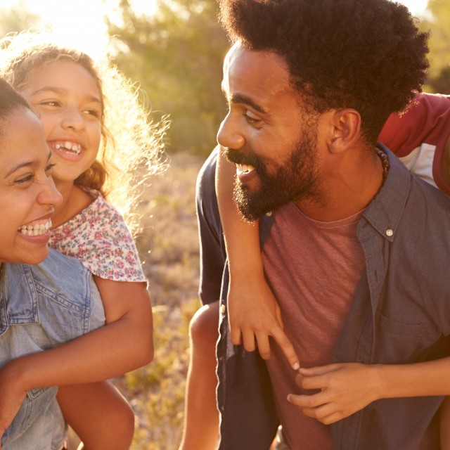 Smiling couple with their two children