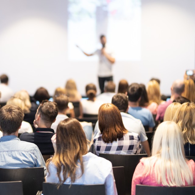 seminar speaker and audience